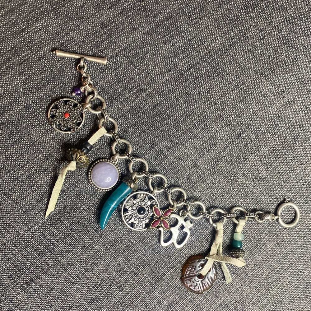 Lucky Brand silver toned toggle bracelet with 9 charms. - Picture 5 of 7